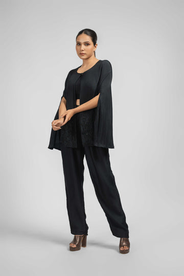 Black Silk Jacket Set with Pants featuring a stylish open-front jacket embellished with pearls, paired with a sleeveless crop top and sleek black pants. Perfect for formal or festive occasions.