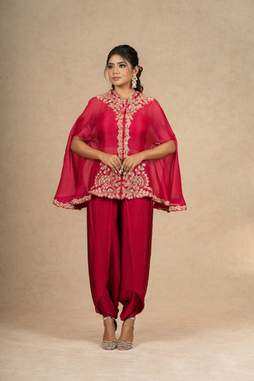 Rani Organza Indowestern outfit featuring a cape-style embroidered top with a bustier and dhoti pants, ideal for festive occasions and formal wear.