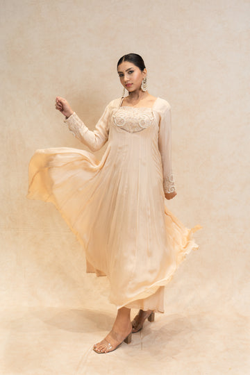 Elegant Beige Gown for Festive Occasions