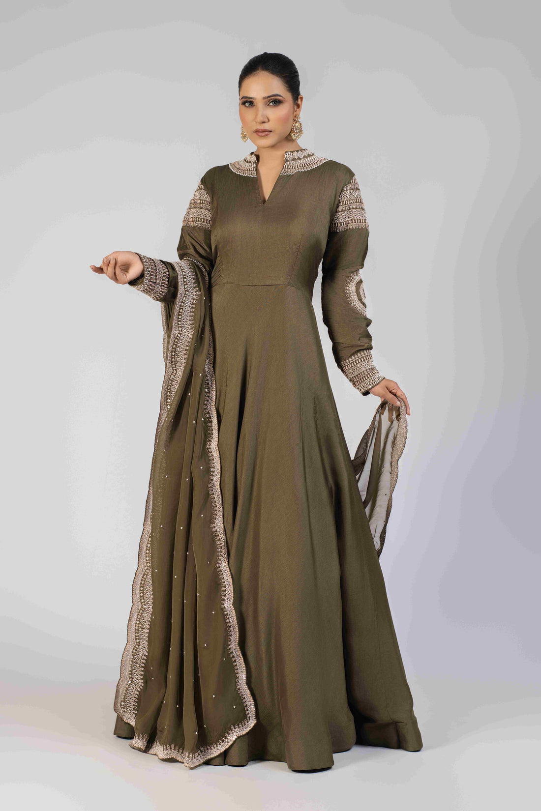 Mehndi Green Silk Gown with high neck embellishments, full sleeves, and an organza dupatta adorned with pearls, kasab, maal, and sequins, perfect for festive and formal occasions.