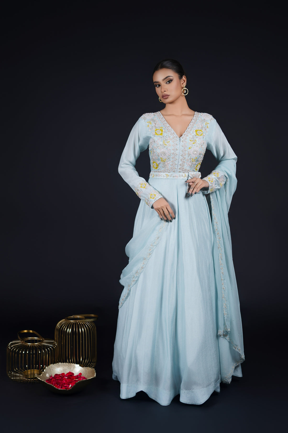 Powder blue embroidered gown with pearls, applique work, cutdana, and thread embroidery, featuring a stylish belt and organza dupatta, perfect for festive and formal occasions.