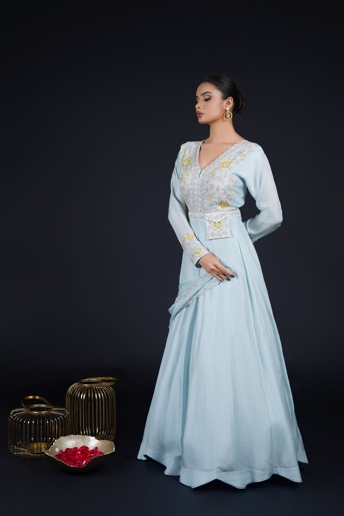 Powder blue embroidered gown with pearls, applique work, cutdana, and thread embroidery, featuring a stylish belt and organza dupatta, perfect for festive and formal occasions.