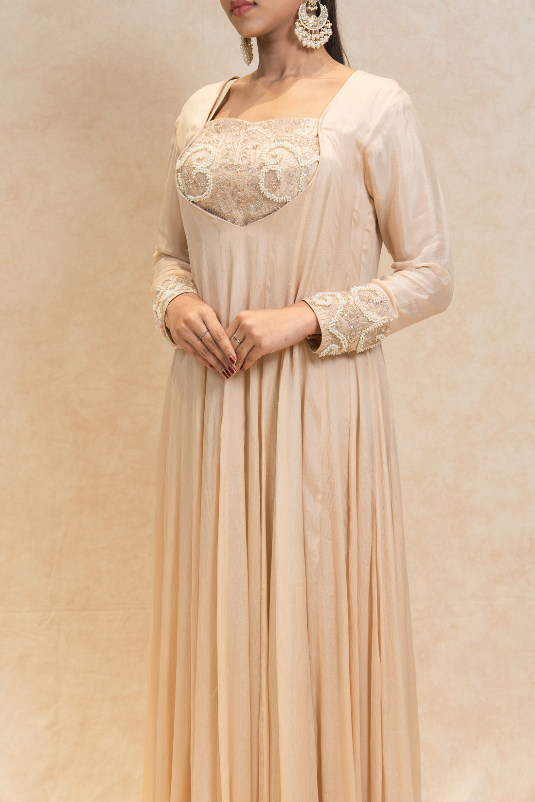 Elegant Beige Gown for Festive Occasions