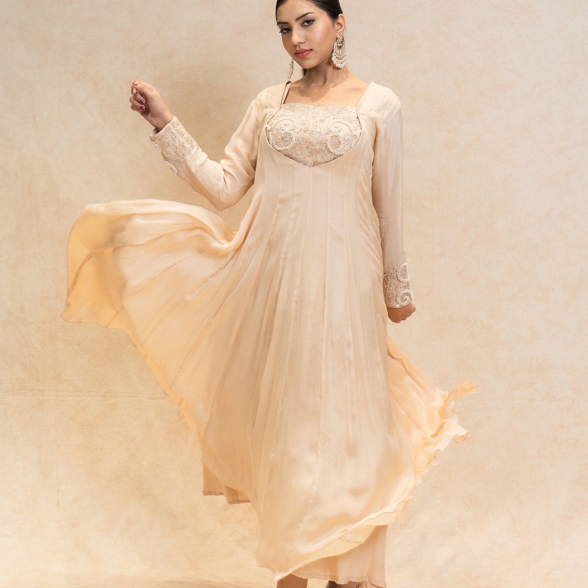 Elegant Beige Gown for Festive Occasions