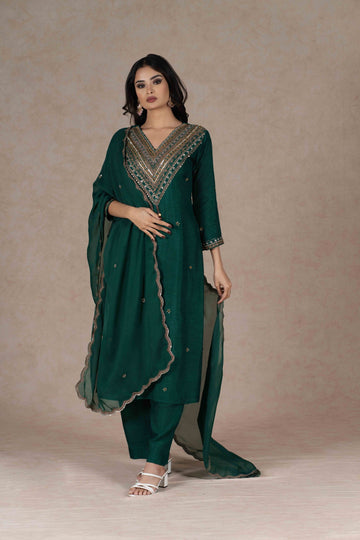 Green embroidered kurta set with a V-neckline, 3/4th sleeves, and gold hand embroidery on the front and dupatta, paired with matching pants.