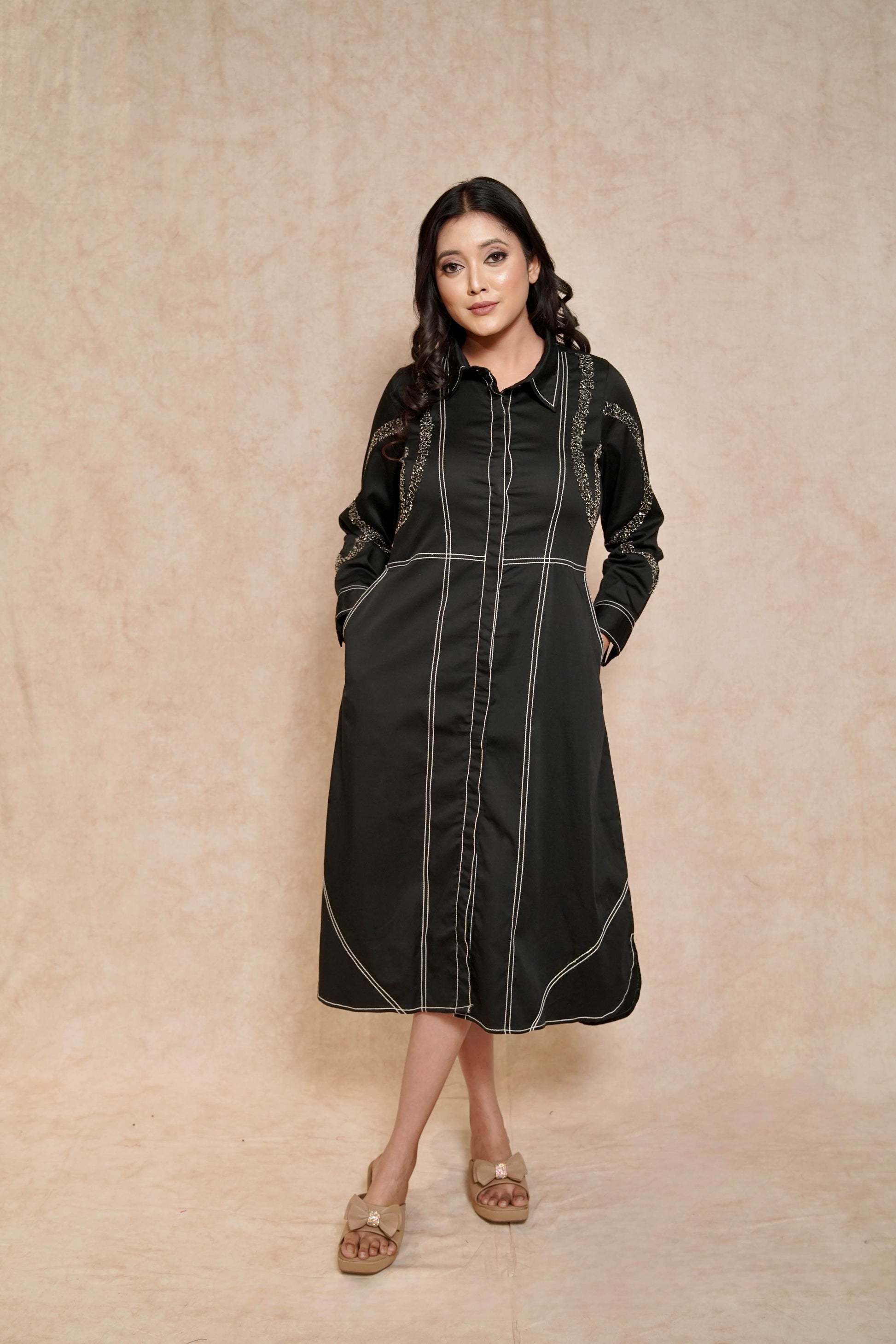 closeup-view-elegant-black-dress-contrasting-stitch-embellished-sleeves-for-women
