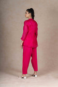 Rear view of the Fuchsia Organza Co-ord Set, featuring a plain back and soft organza fabric, paired with tailored pants.