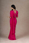 Fuchsia ready-to-wear drape saree with embellished blouse and tie-up belt, crafted in lightweight crepe fabric for a stylish and comfortable festive look. Tie up dori at the back.