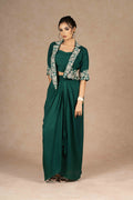 Elegant emerald green Indo-western with embroidered jacket and drape skirt perfect for any festive or formal occasion.