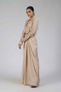 Ivory silk Indo-western set featuring an embellished blazer with pearl, kasab, sequin, and pitai work, paired with a sleeveless crop top and a pleated dhoti-style drape skirt.