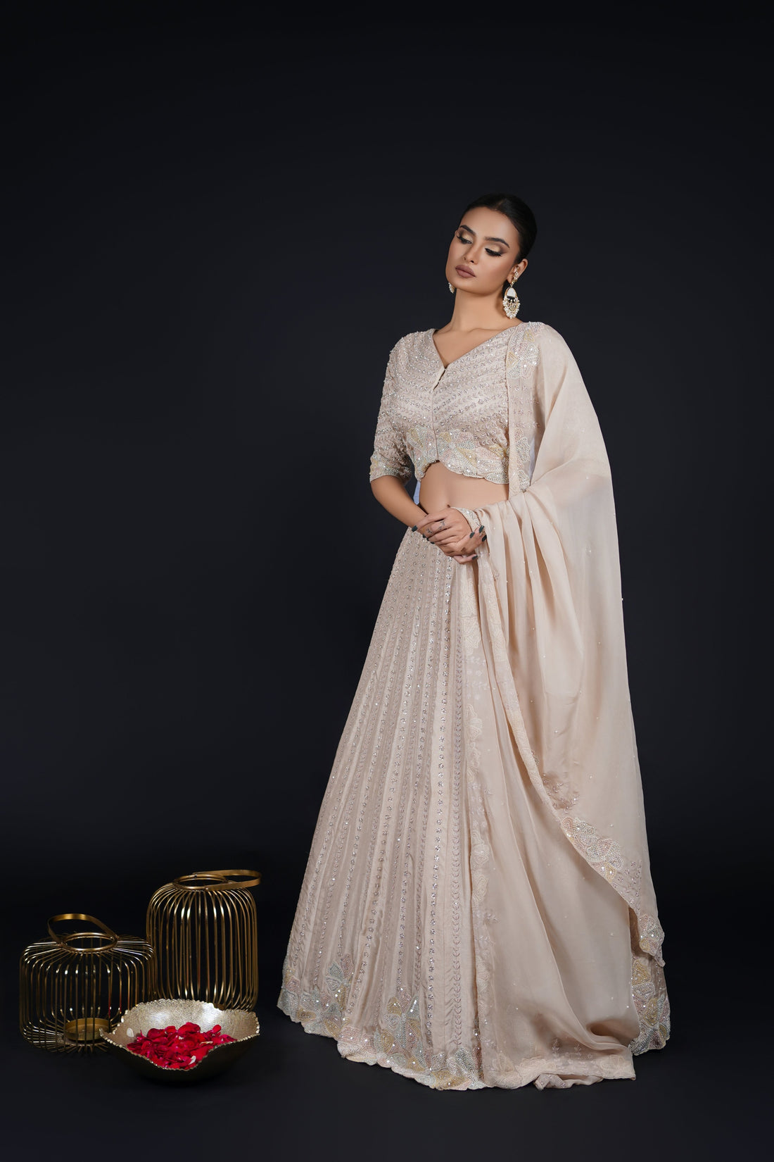 Ivory Lehenga Set with Organza Dupatta - Intricately Embellished Bridal and Festive Wear.