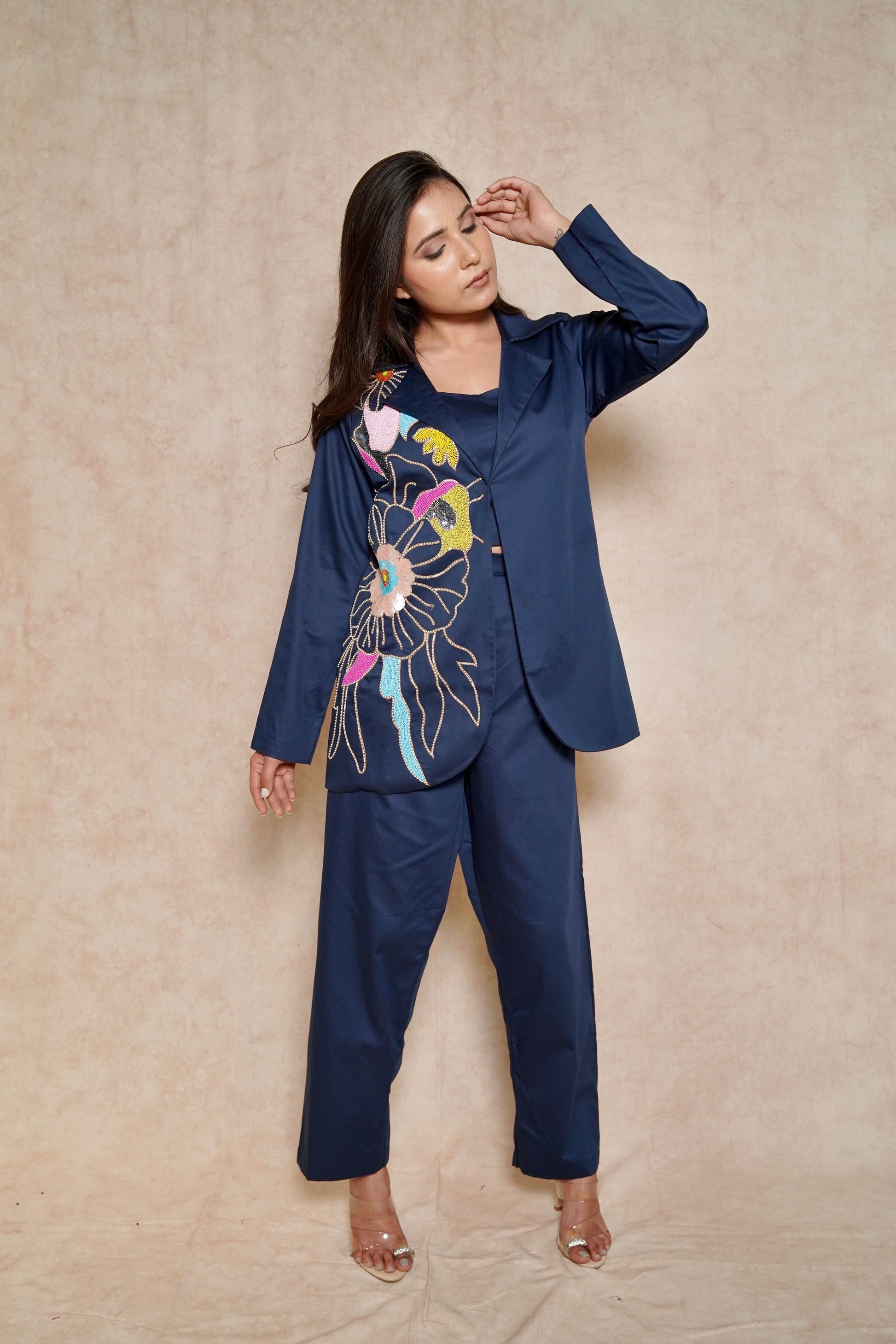 model-posing-navy-blue-pant-suit-set-with-floral-hand-work-coord-set-for-women