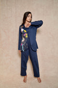 model-posing-navy-blue-pant-suit-set-with-floral-hand-work-for-women