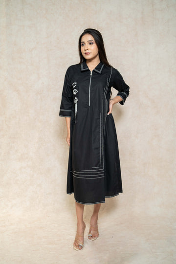 model-showing-black-evil-eye-motif-dress