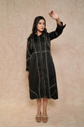 model-showing-elegant-black-dress-contrasting-stitch-embellished-sleeves