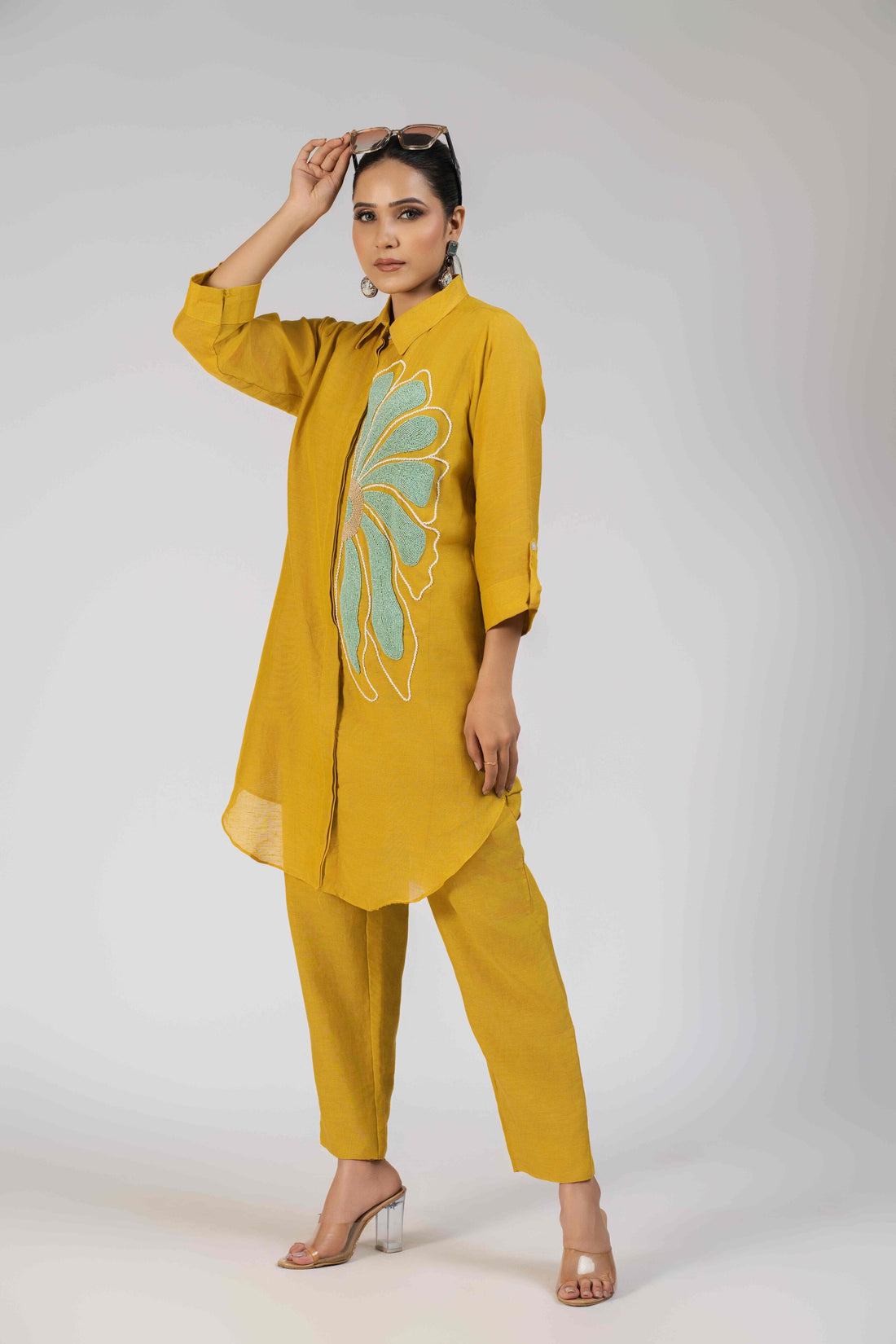 Mustard Yellow Linen Cotton Co-ord Set with an embroidered shirt and straight-leg pants.