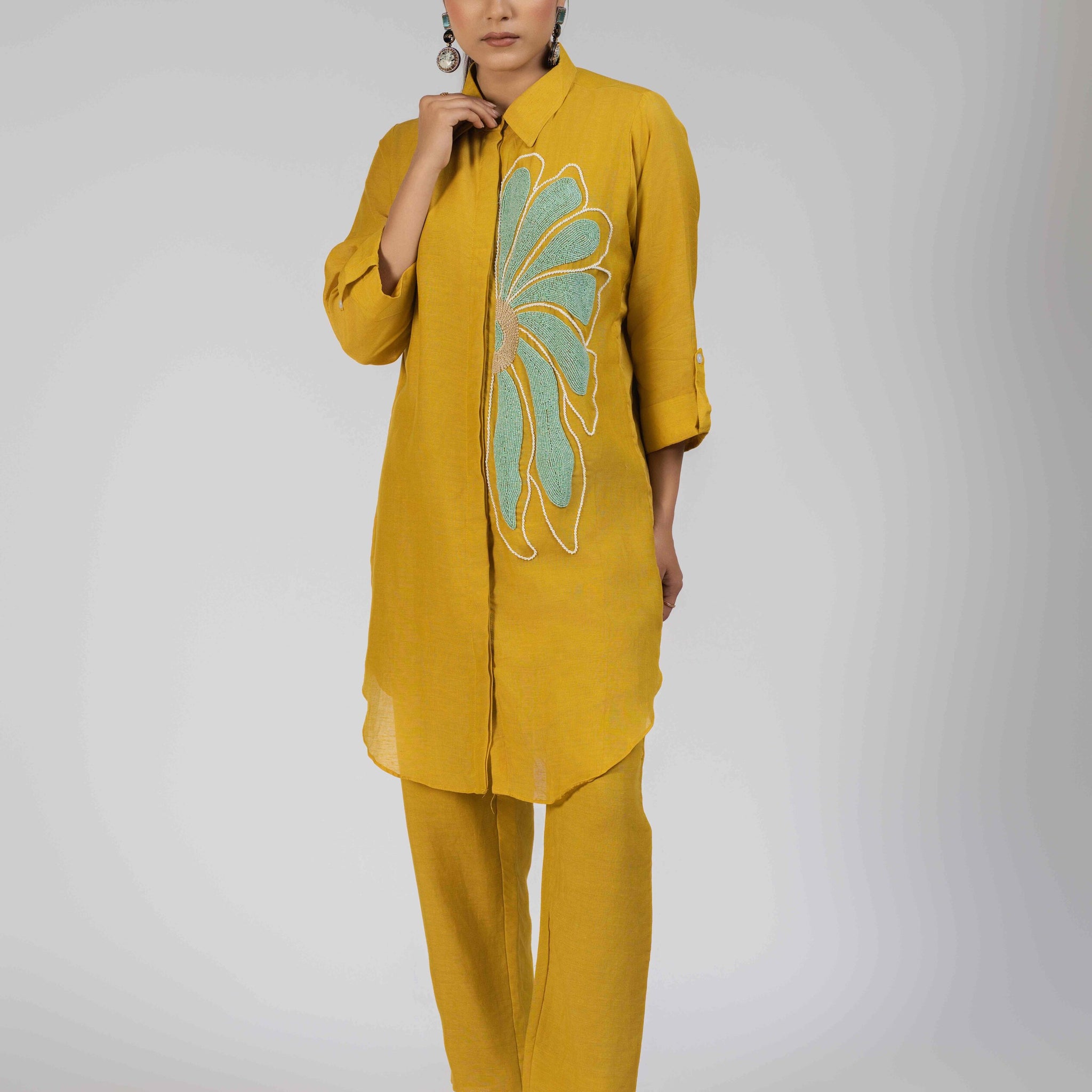 Mustard Yellow Linen Cotton Co-ord Set with an embroidered shirt and straight-leg pants.