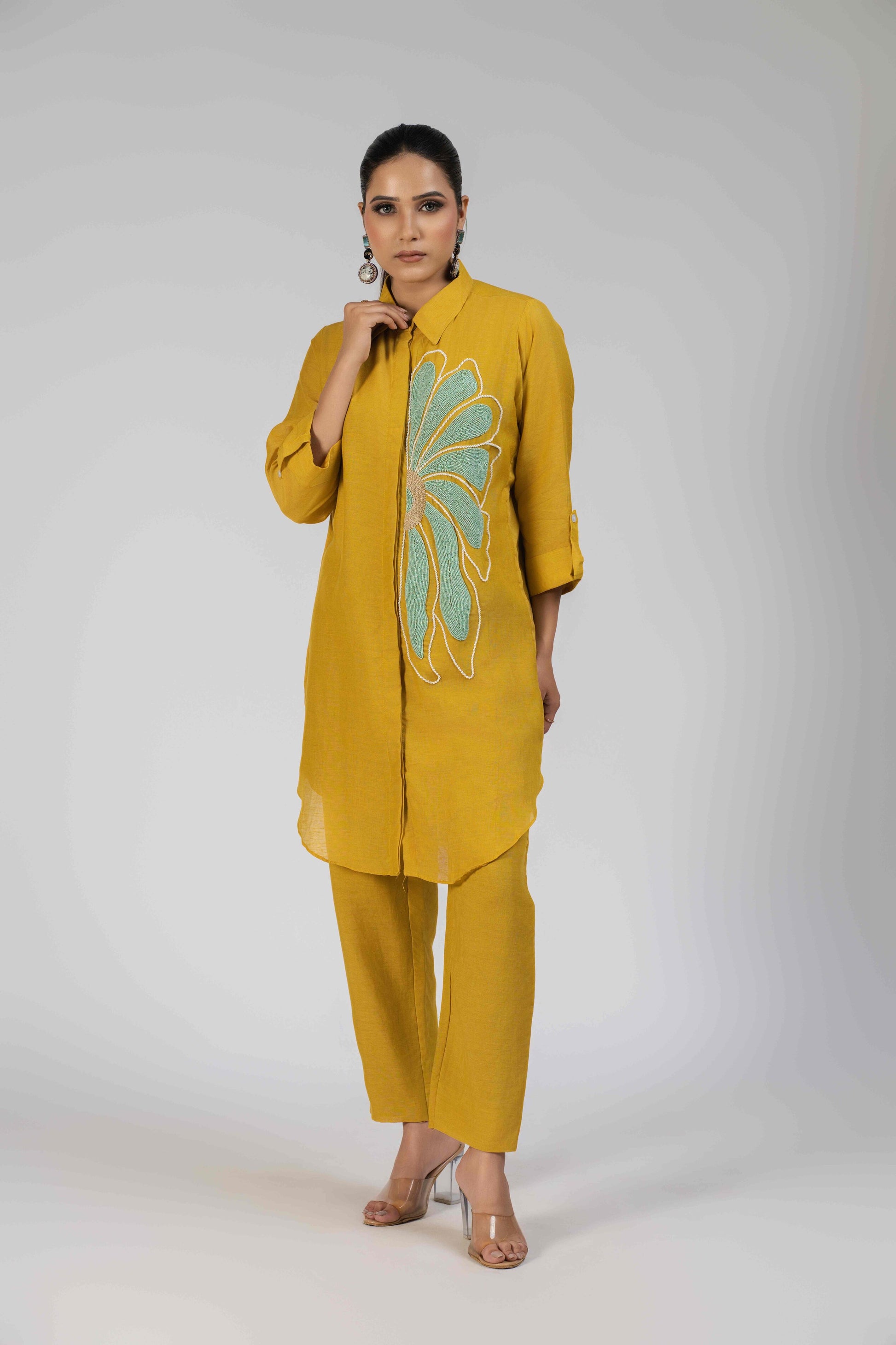 Mustard Yellow Linen Cotton Co-ord Set with an embroidered shirt and straight-leg pants.