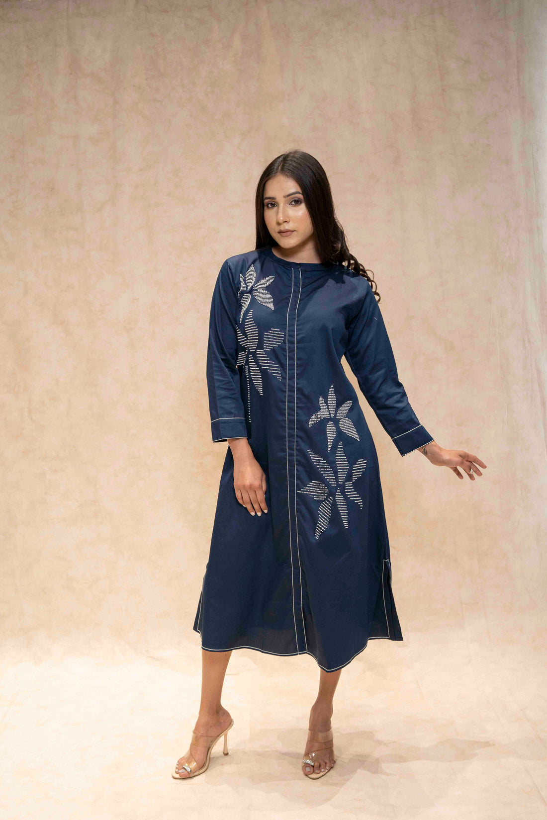 Model wearing navy blue floral embroidered kurta