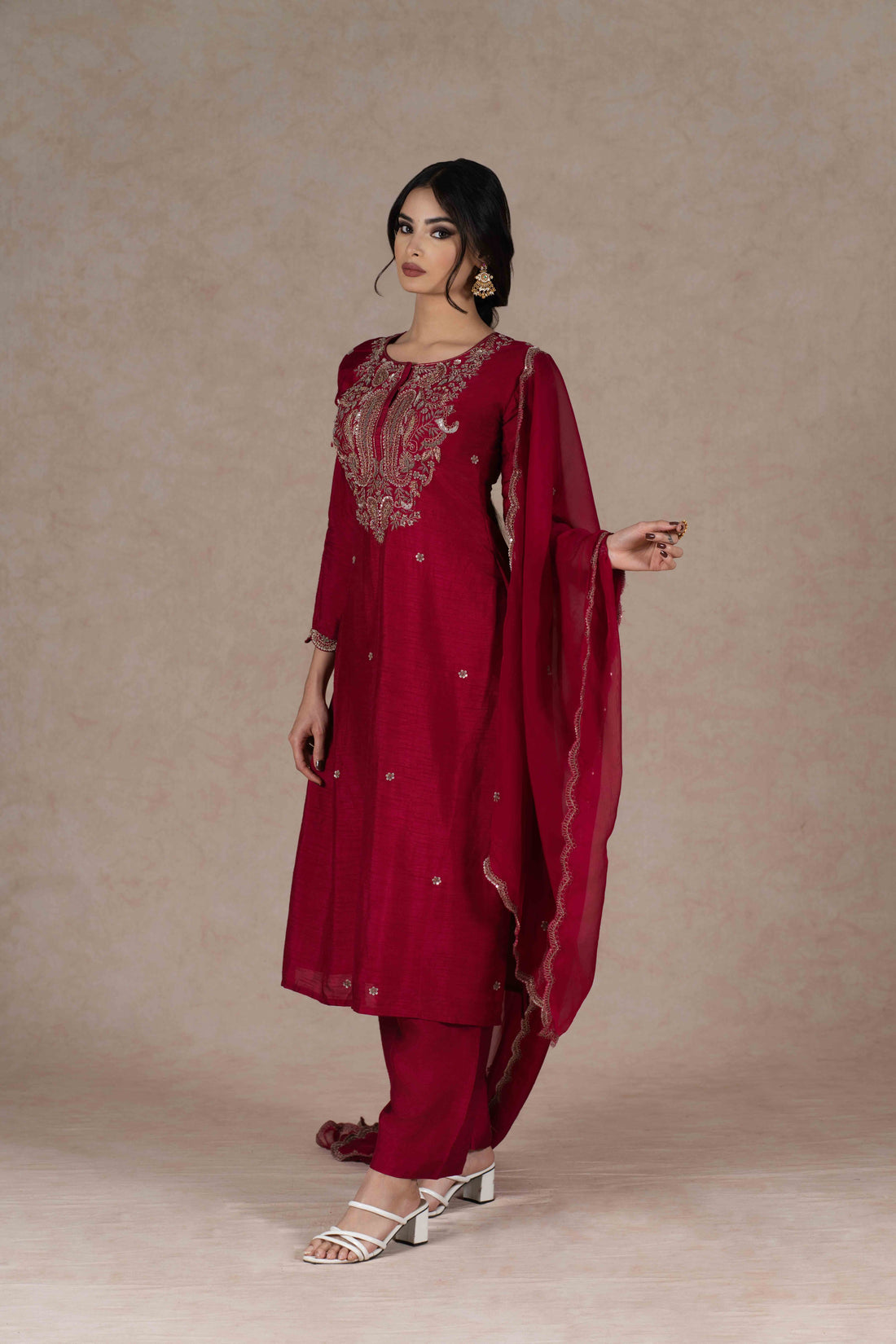 Deep red kurta and pant set with intricate zardozi embroidery, paired with an organza dupatta—perfect for festive occasions, pujas, and celebrations