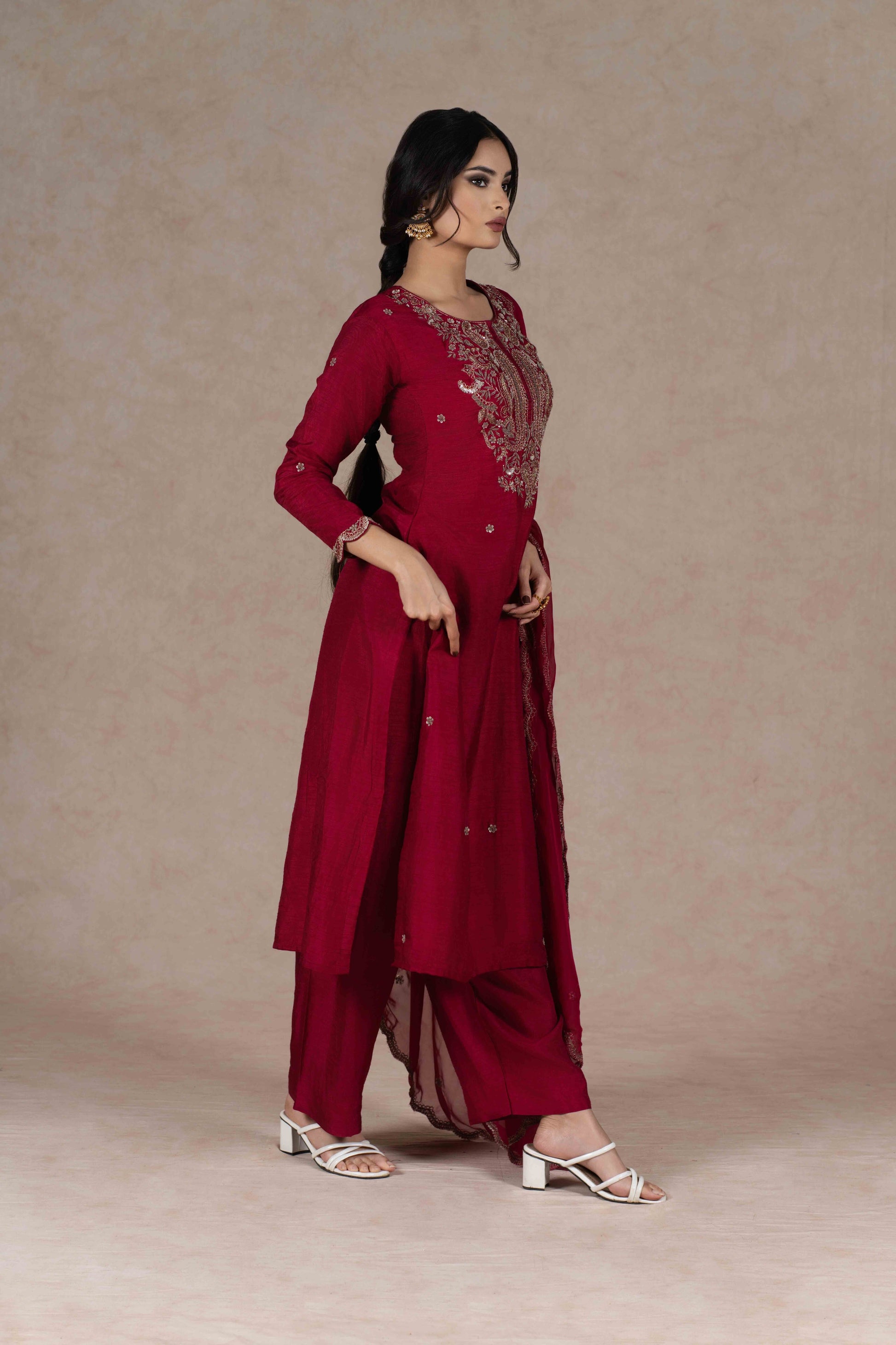 Deep red kurta and pant set with intricate zardozi embroidery, paired with an organza dupatta—perfect for festive occasions, pujas, and celebrations