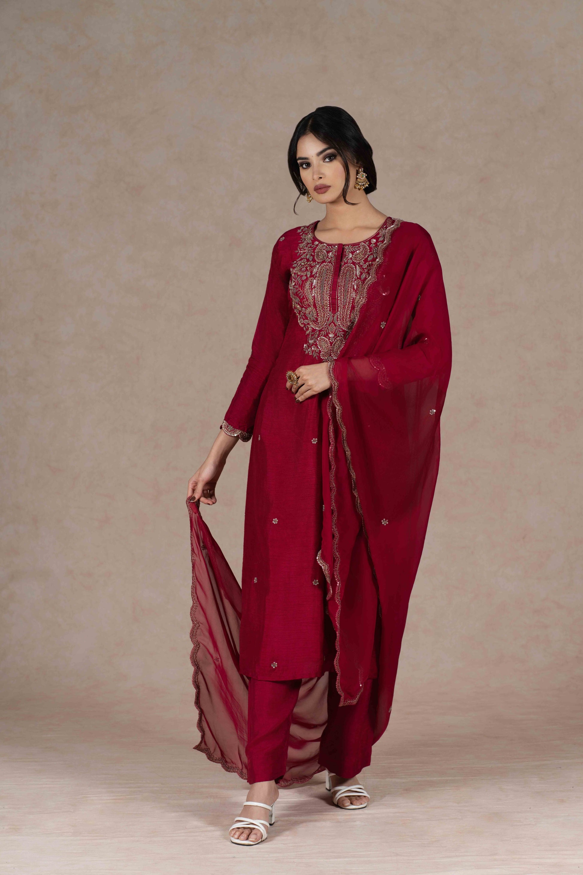 Deep red kurta and pant set with intricate zardozi embroidery, paired with an organza dupatta—perfect for festive occasions, pujas, and celebrations