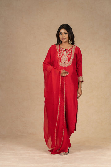 Red silk straight suit with intricate gold embroidery, featuring a matching pair of pants and an embellished organza dupatta – perfect for festive and formal occasions.