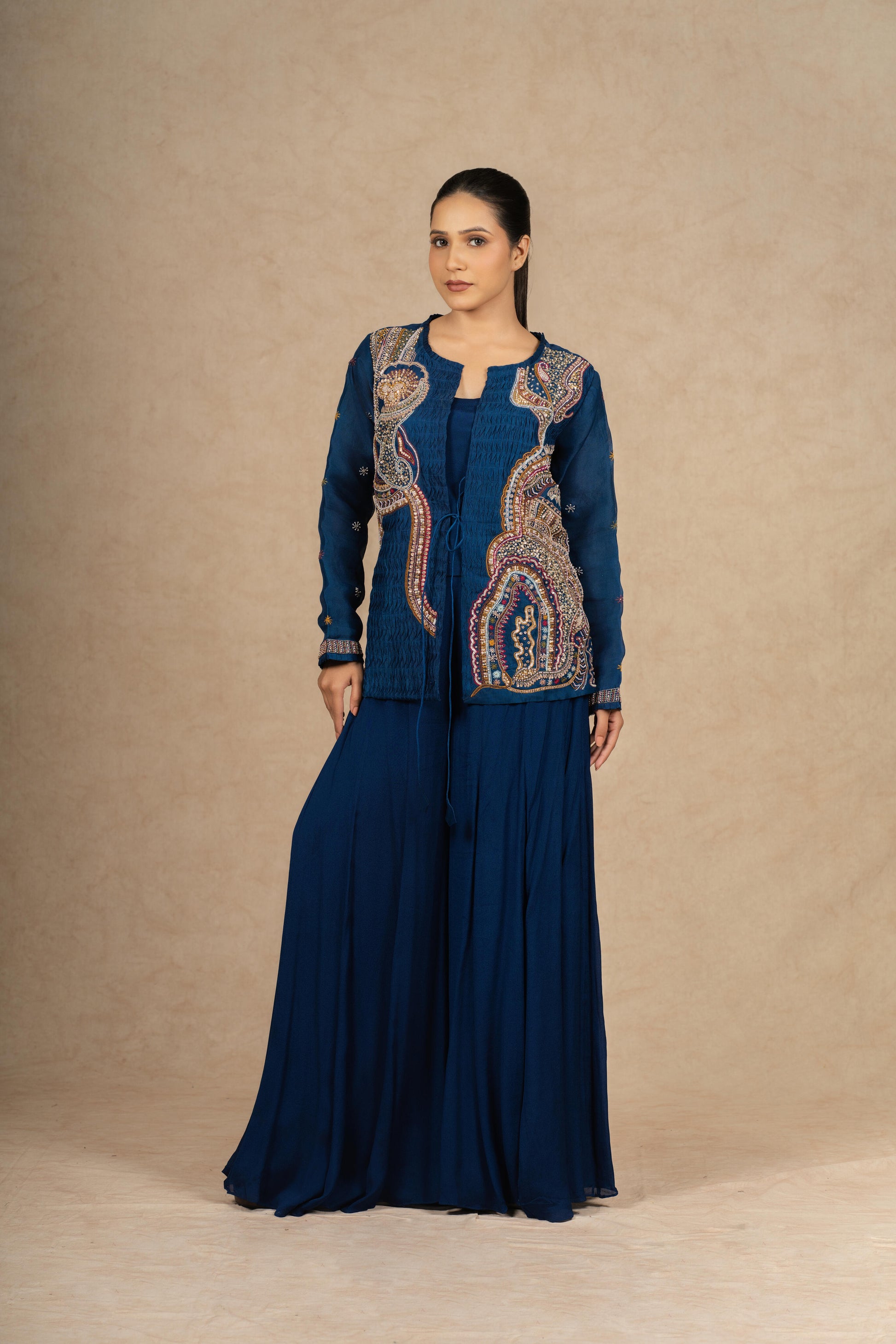 Elegant royal blue Indo Western dress with a fusion of traditional embroidery and contemporary design.