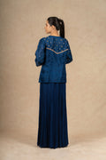 Back view of the royal blue Indo Western outfit, featuring delicate embroidered details on the sheer organza fabric.