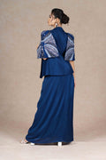 Royal blue embroidered jacket with cape sleeves, sweetheart neckline bustier, and pleated floor-length skirt. Elegant festive or formal ensemble.